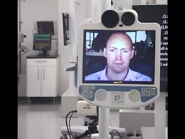 InTouch Health telepresence robot screen showing a remote critical care specialist